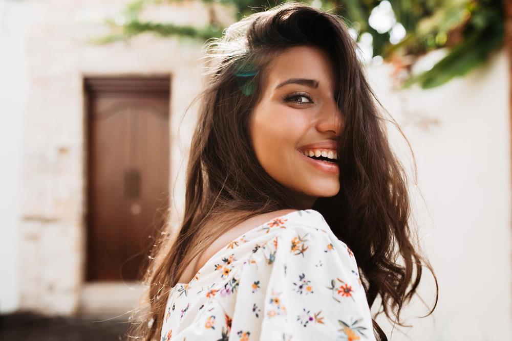 woman with smooth skin after Scarlet Pro microneedling